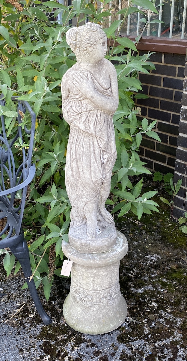 A reconstituted stone classical garden figure of a girl, on pedestal base, height 121cm